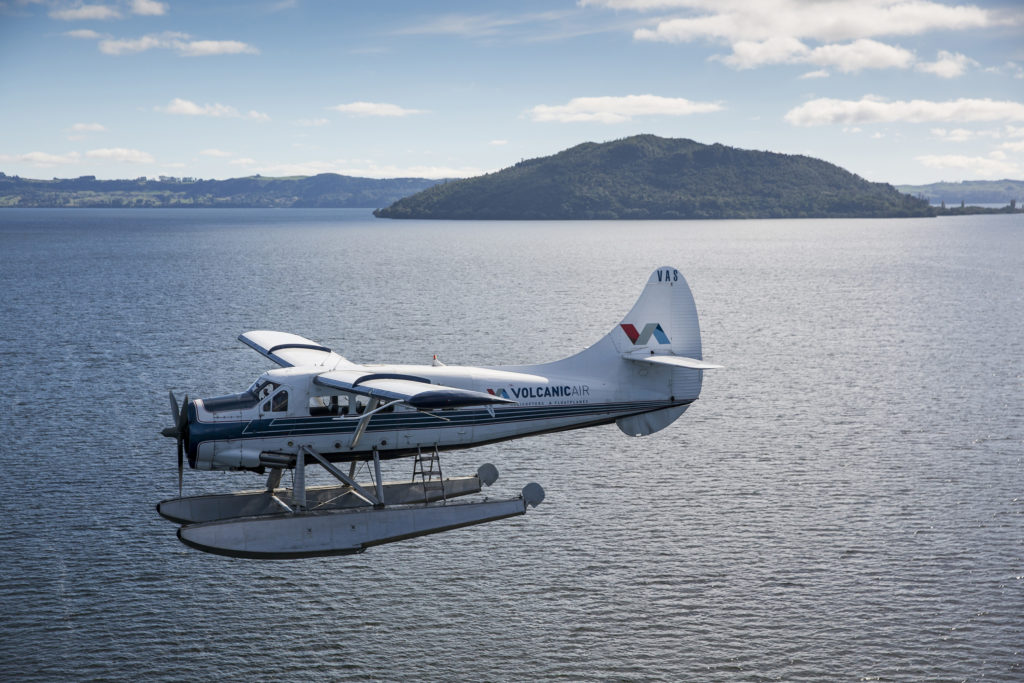 Floatplane with Mokoia Island in background